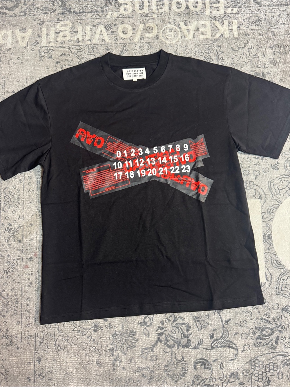 Maison Martin Margiela Black Short-Sleeve Tee with Red and White Graphic